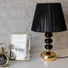 Table lamp 02 min | آباژور رومیزی سرامیکی مدل آتریسا رنگ مشکی طلایی